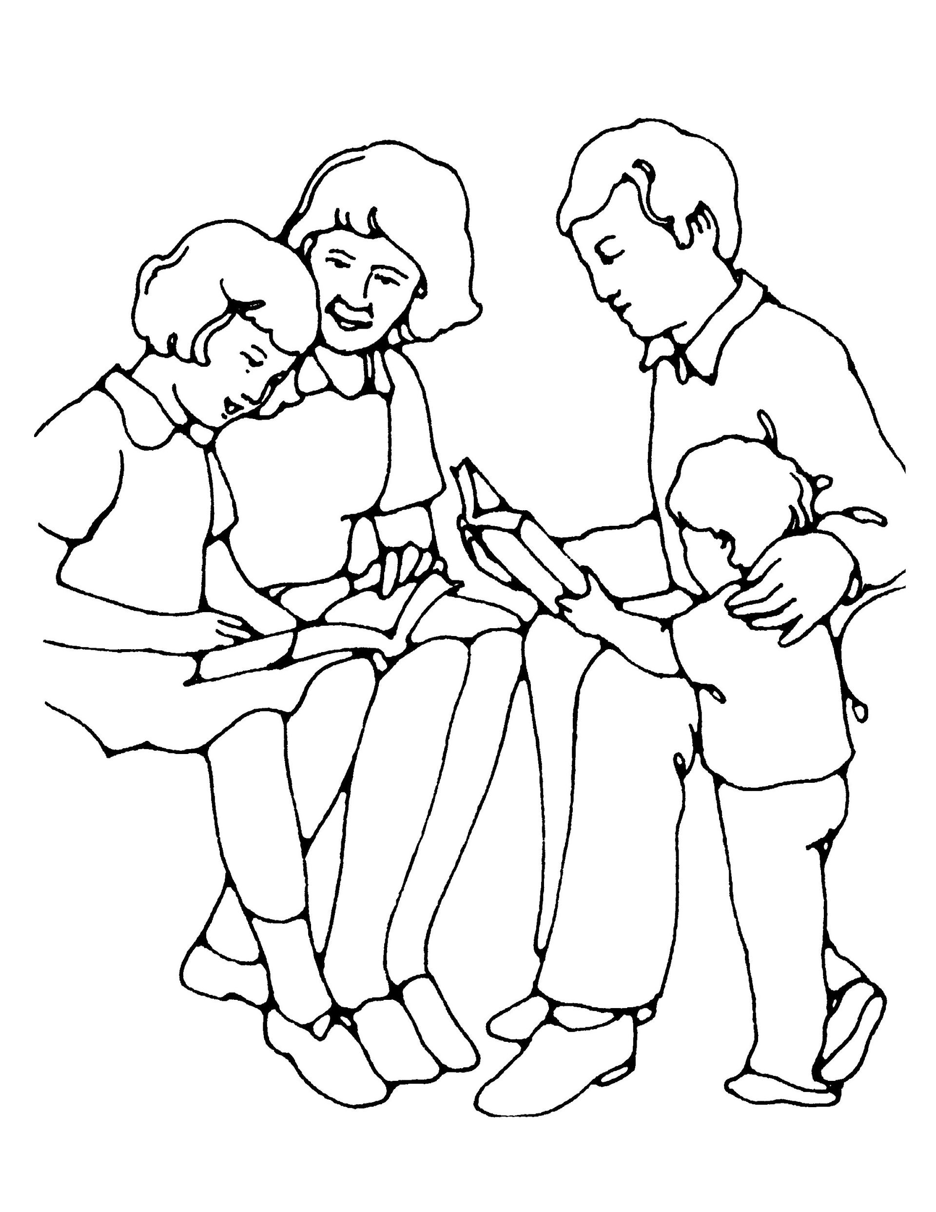 A family of four sits together and reads the scriptures.