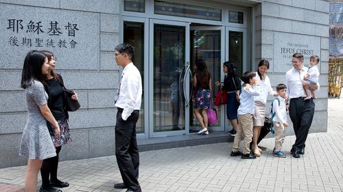 group of people outside Church building