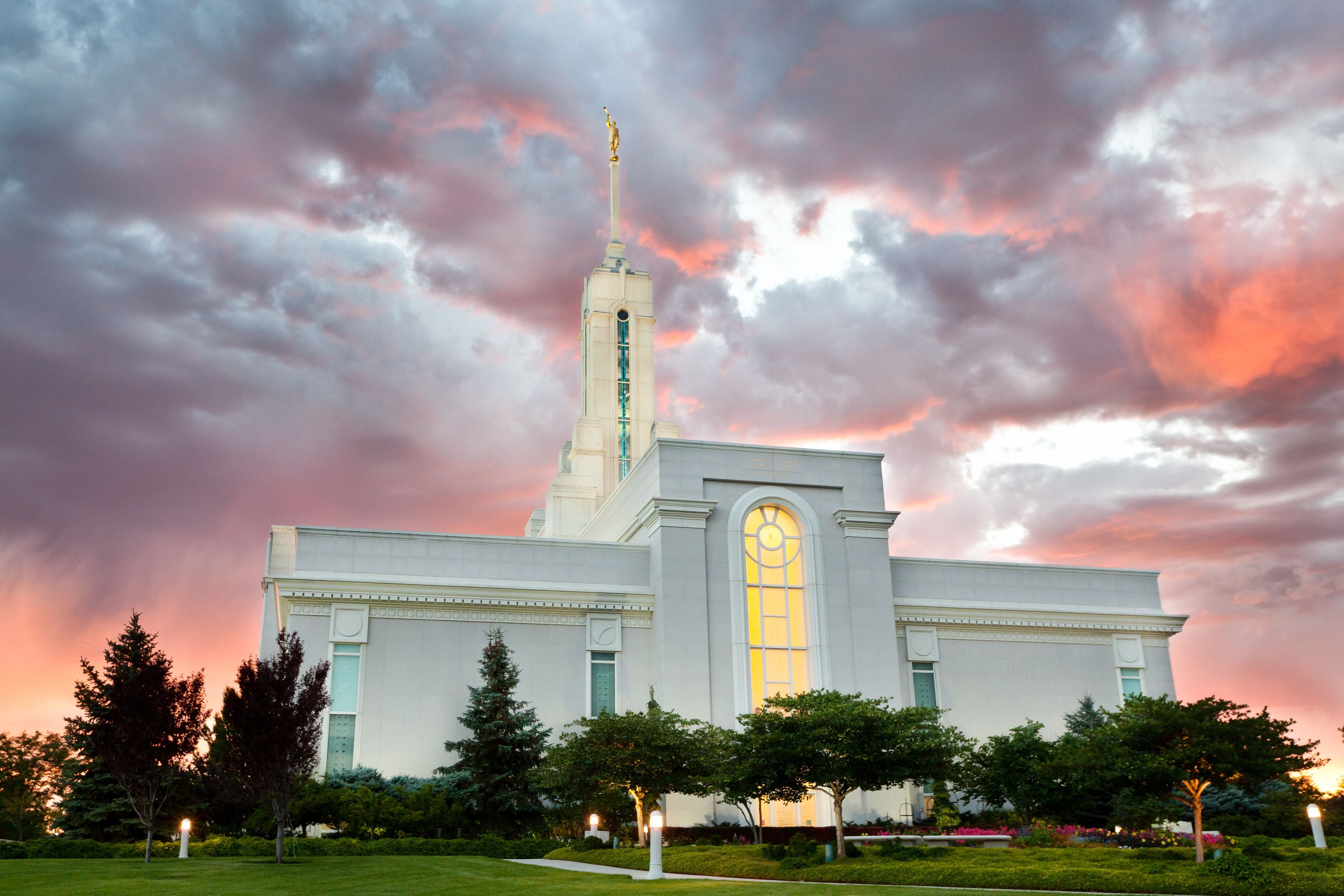 The Mount Timpanogos Utah Temple at sunset, including scenery.