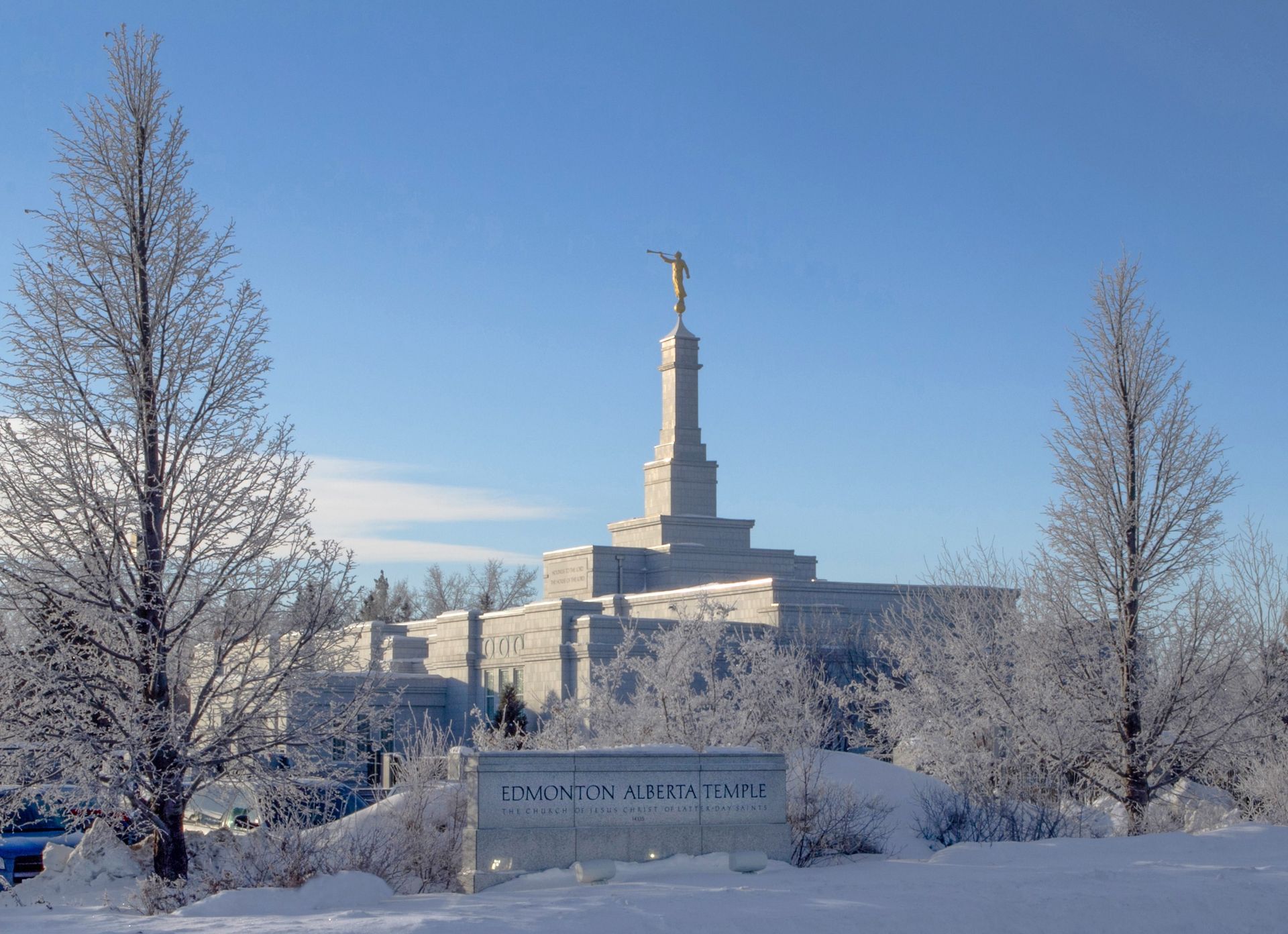 Snow covers the grounds of the Edmonton Alberta Temple in the winter.