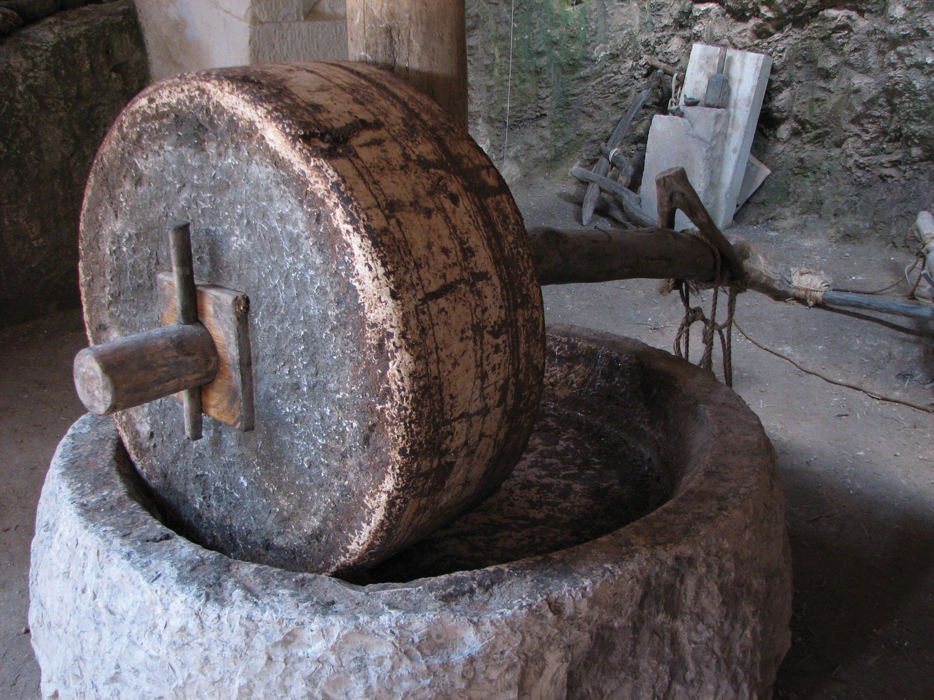 A round millstone made from solid rock.