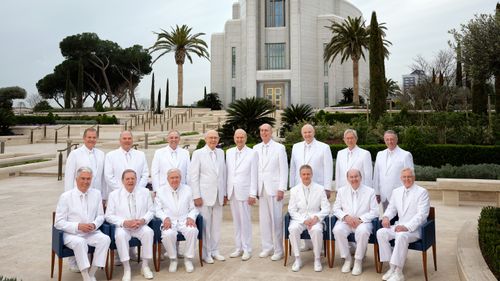 prophet and apostles standing in front of a temple