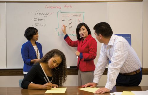 A group of people meeting together and counseling